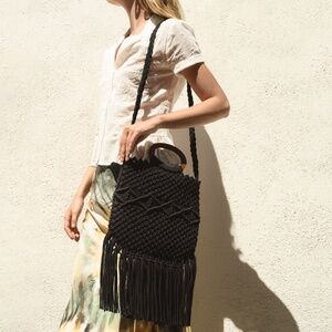 Danielle Nicole black crochet tassel bag